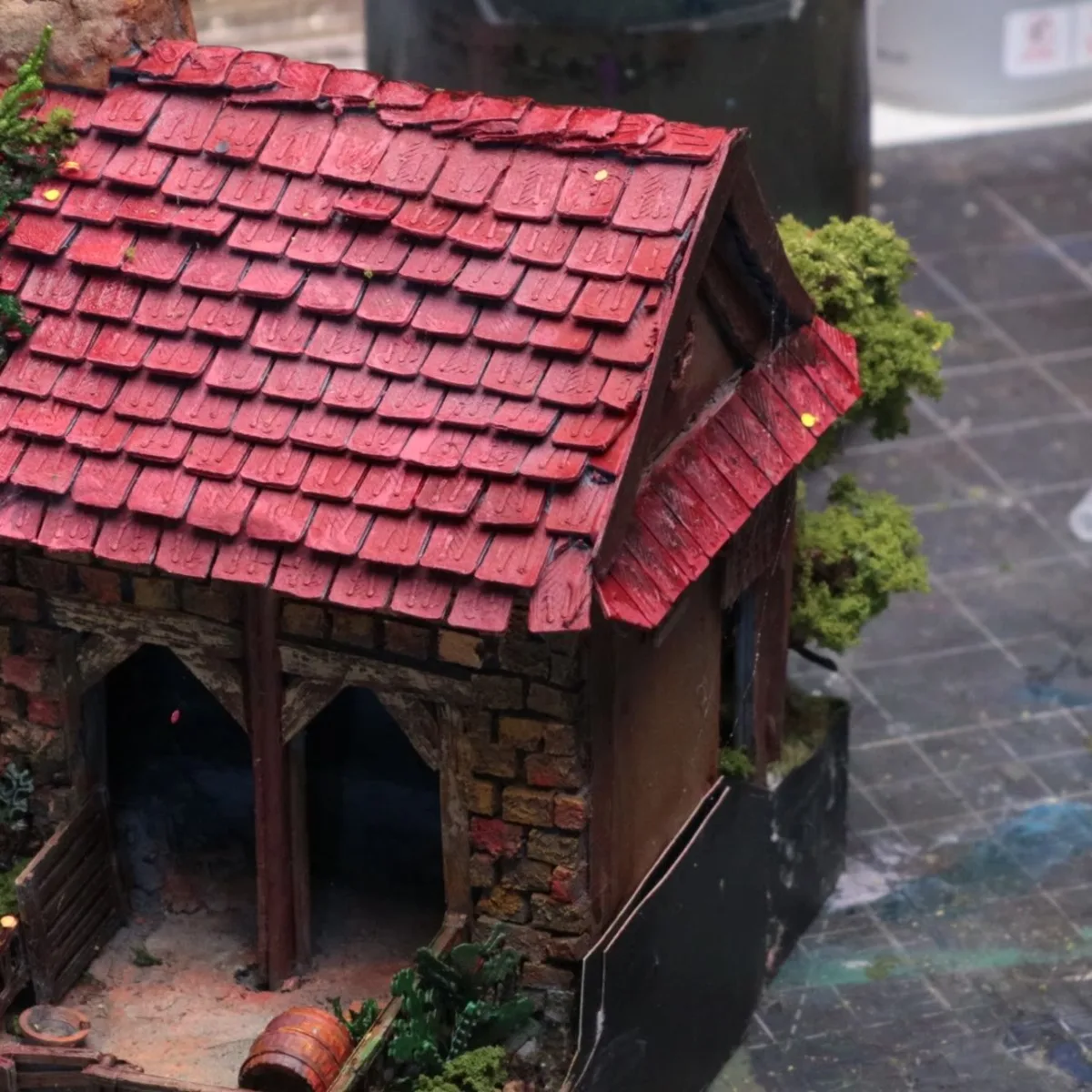 A painted cottage roof made from printed slate shingle strips