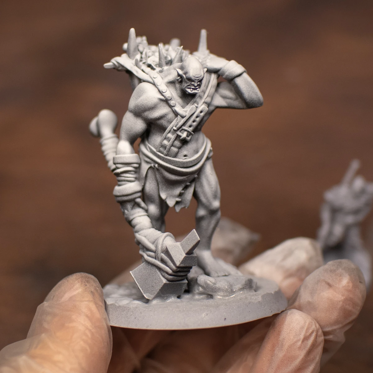 The original physical Builder miniature with hammer and bone armour