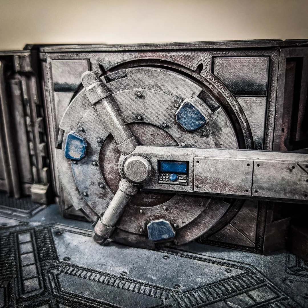 A weathered printed and painted circular sci-fi vault door in a modular wall